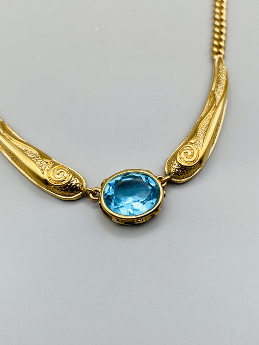 Collier Pierre Lang vintage – doré à pierre bleue centrale