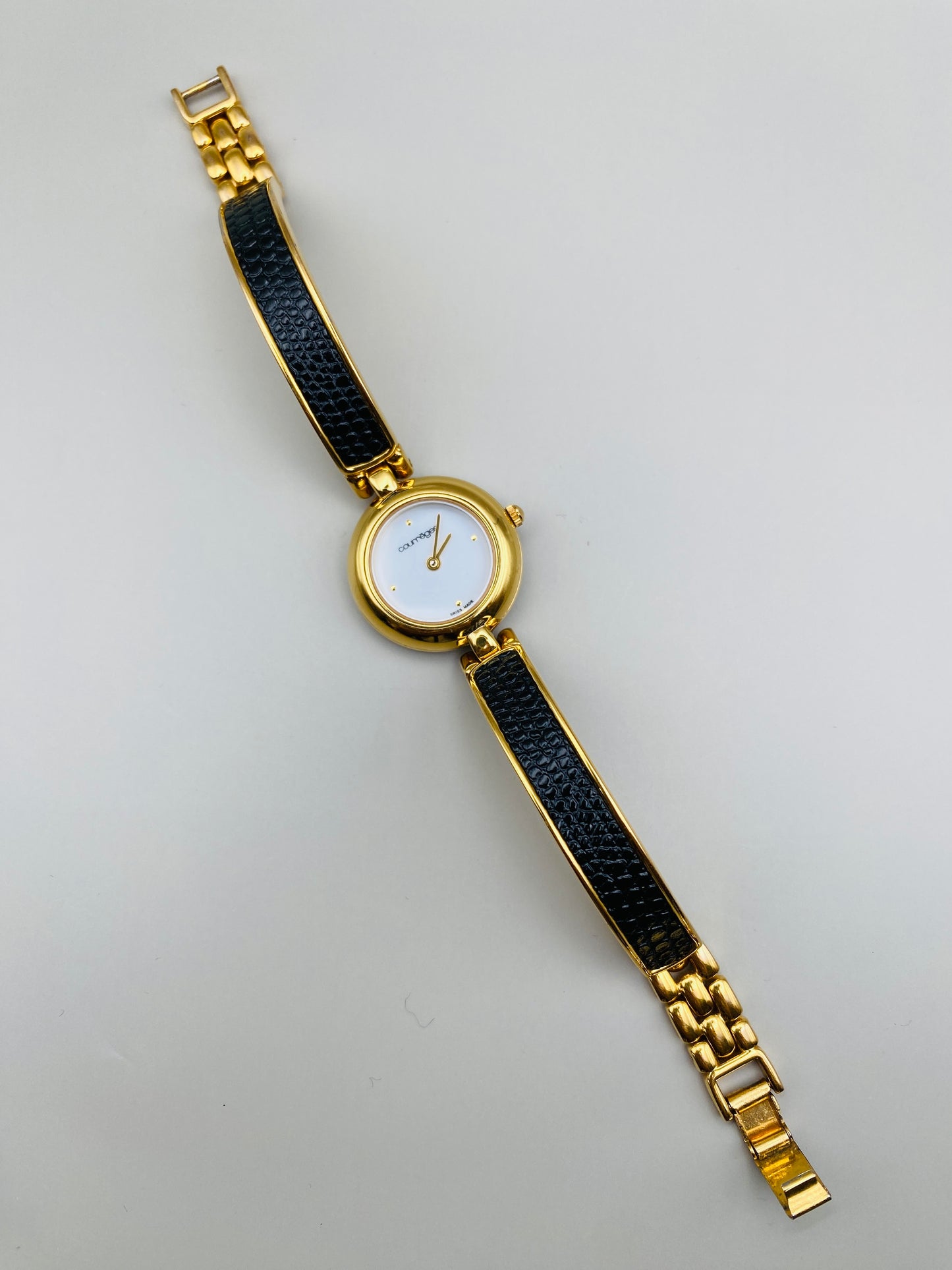 Montre Vintage Courrèges Paris – Swiss Made, dorée et cuir noir