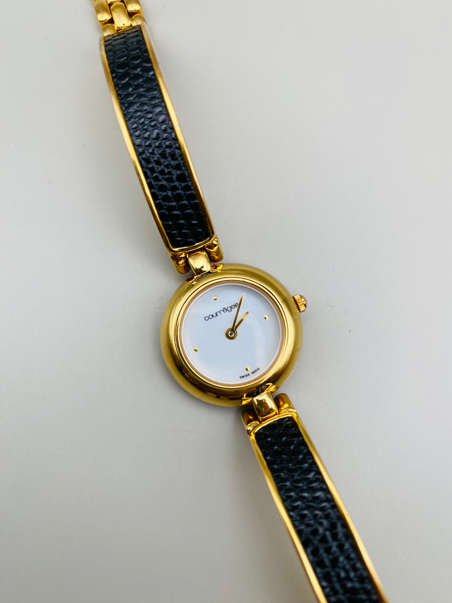 Montre Vintage Courrèges Paris – Swiss Made, dorée et cuir noir