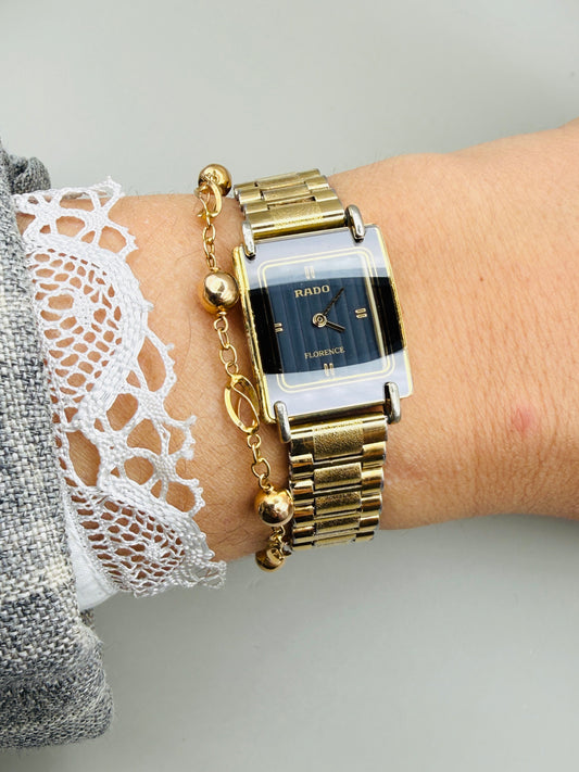 Montre vintage Rado – plaquée or & cadran noir graphique