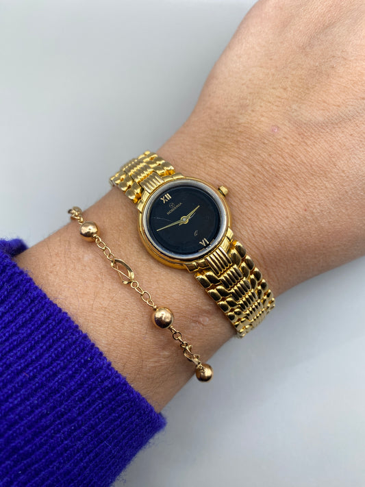 Montre Rodania vintage – montre-bijou dorée à bracelet articulé