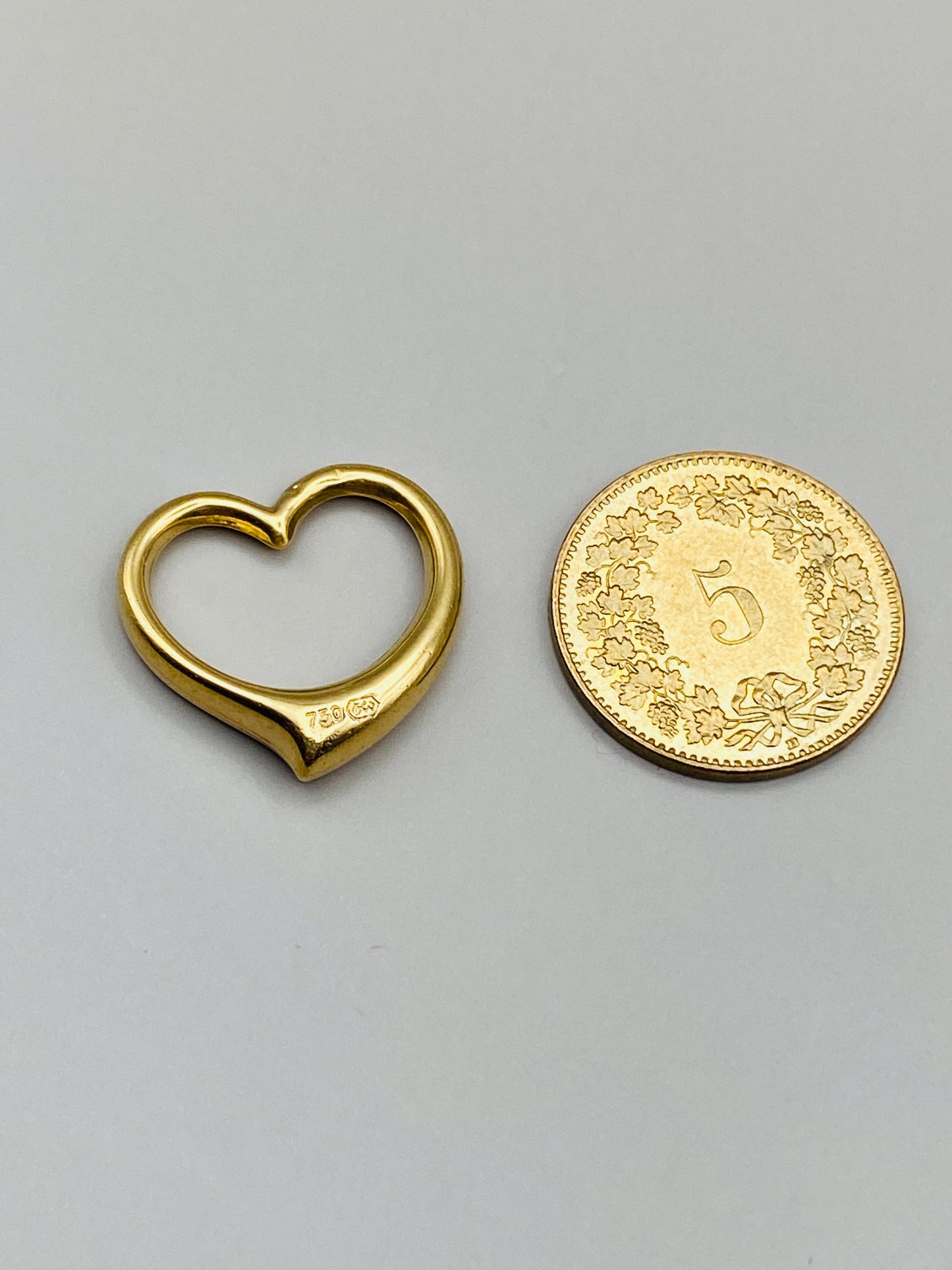 Pendentif vintage cœur ajouré en or 18 carats