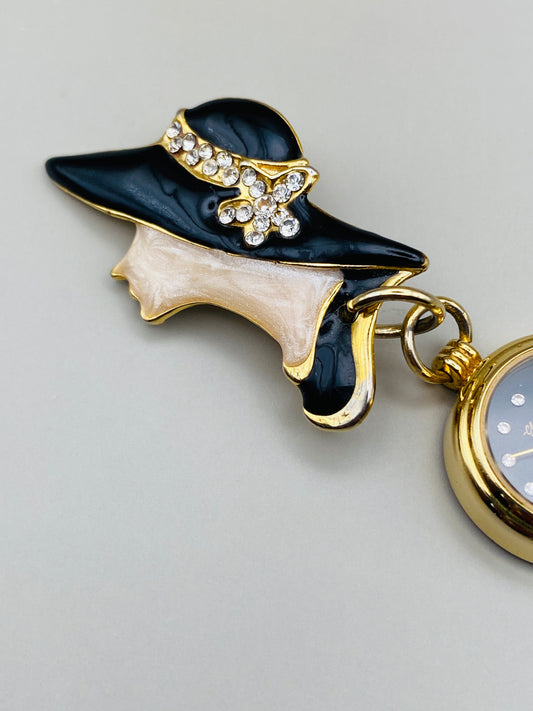 Broche-montre Vintage Claudio Calli – Émail noir et dorure