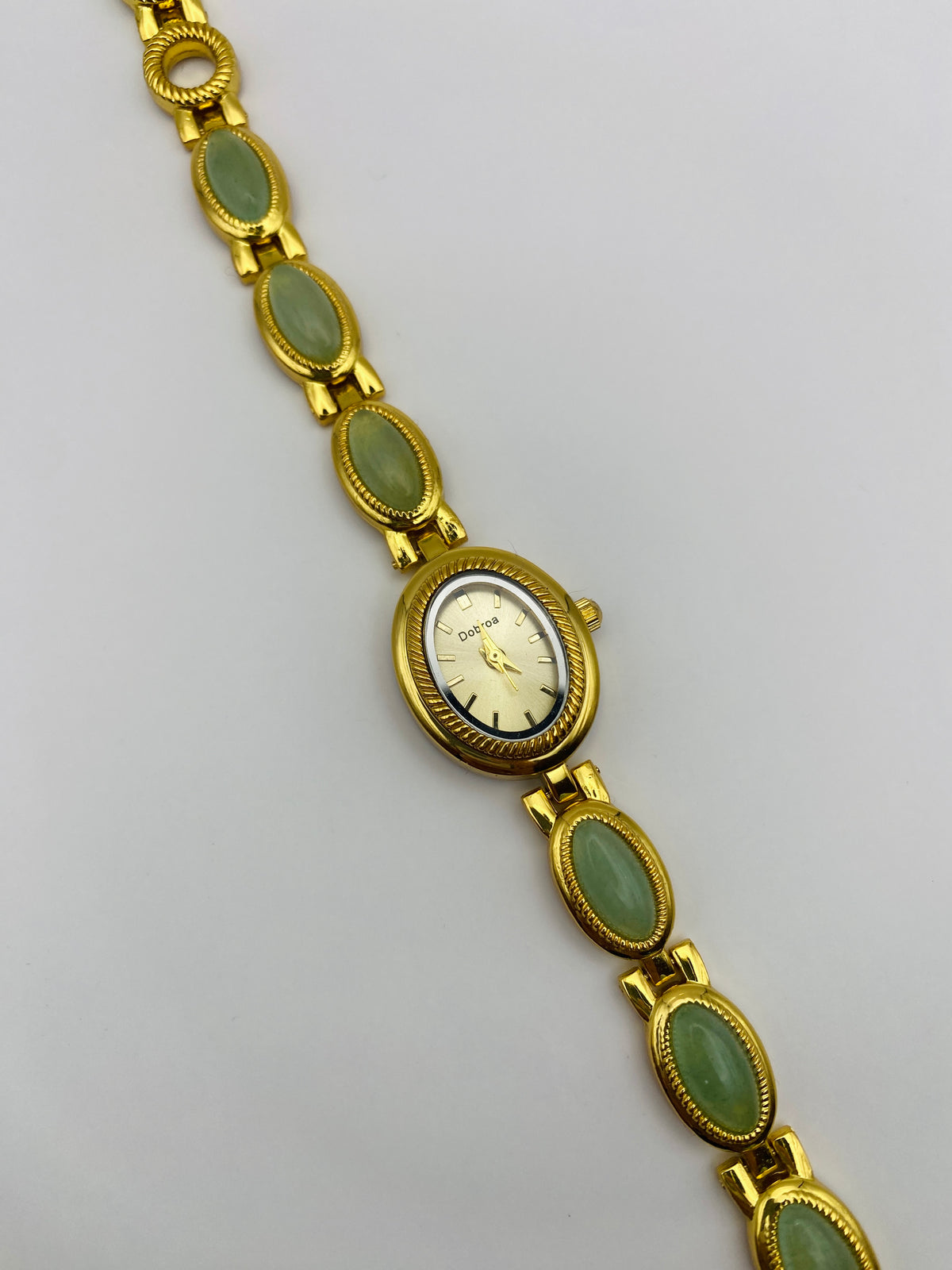 Montre-bijou Dobroa – cabochons verts