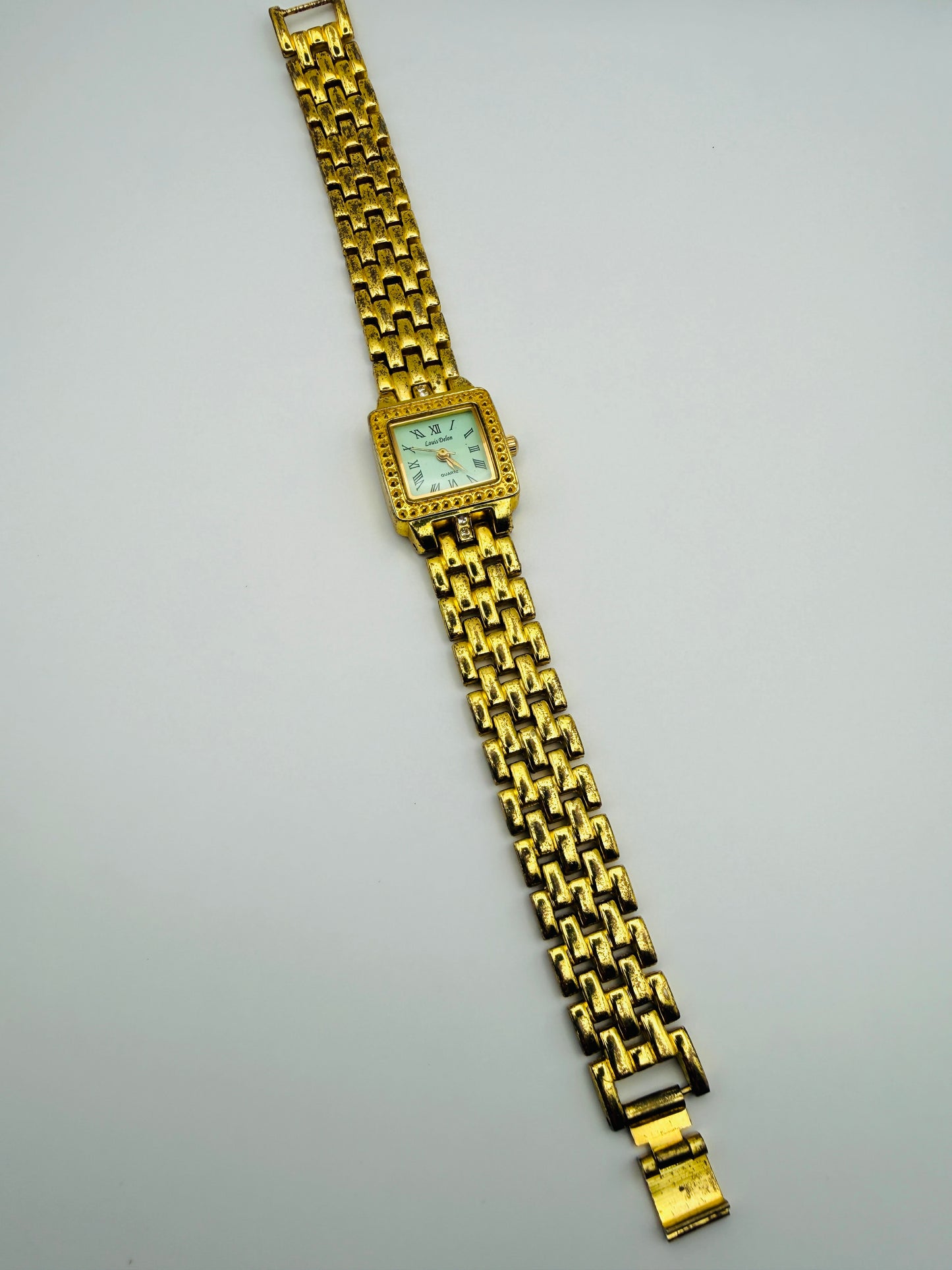 Montre vintage Louis Dolon dorée – cadran carré serti de strass