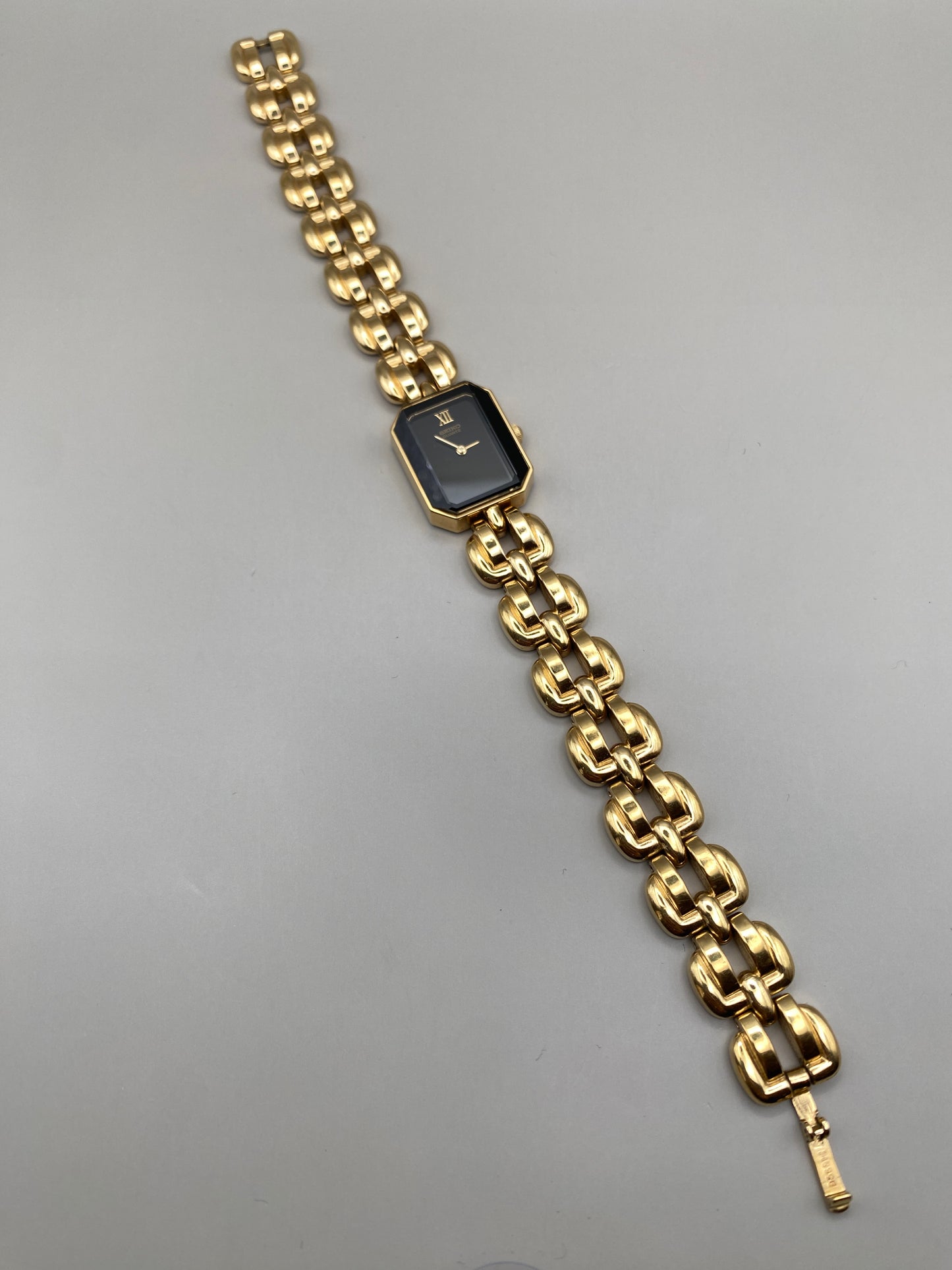 Montre Seiko vintage – montre-bijou dorée à maille articulée