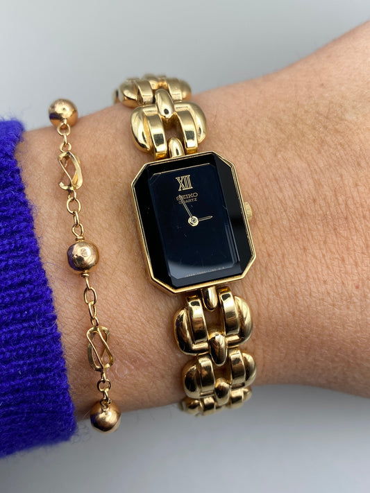 Montre Seiko vintage – montre-bijou dorée à maille articulée