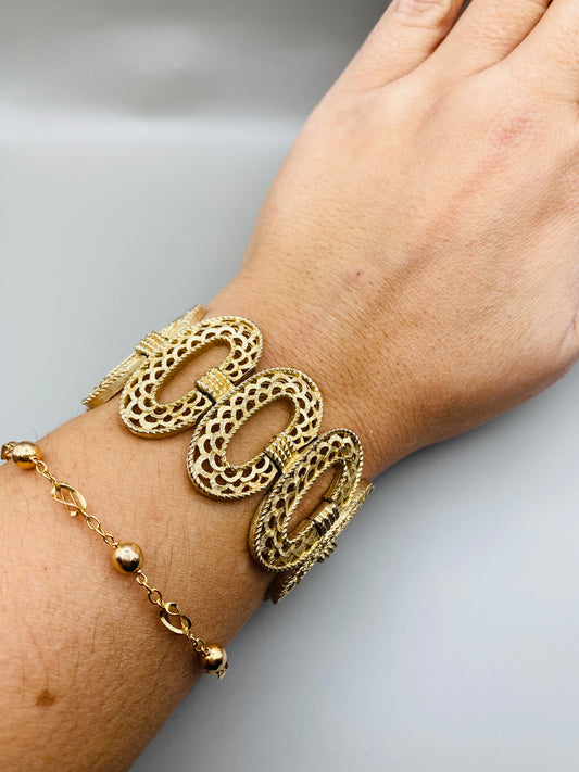 Bracelet vintage Trifari – Large maillons ajourés dorés (neuf)