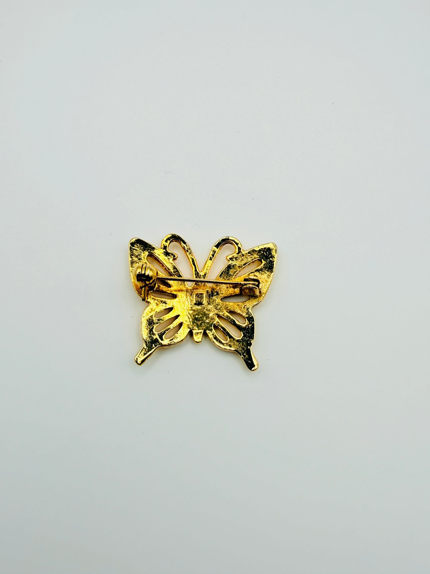 Broche papillon dorée vintage ajourée