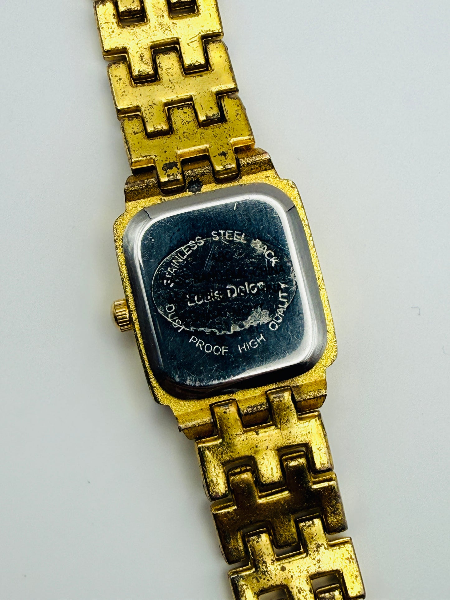 Montre vintage Louis Dolon dorée – cadran carré serti de strass