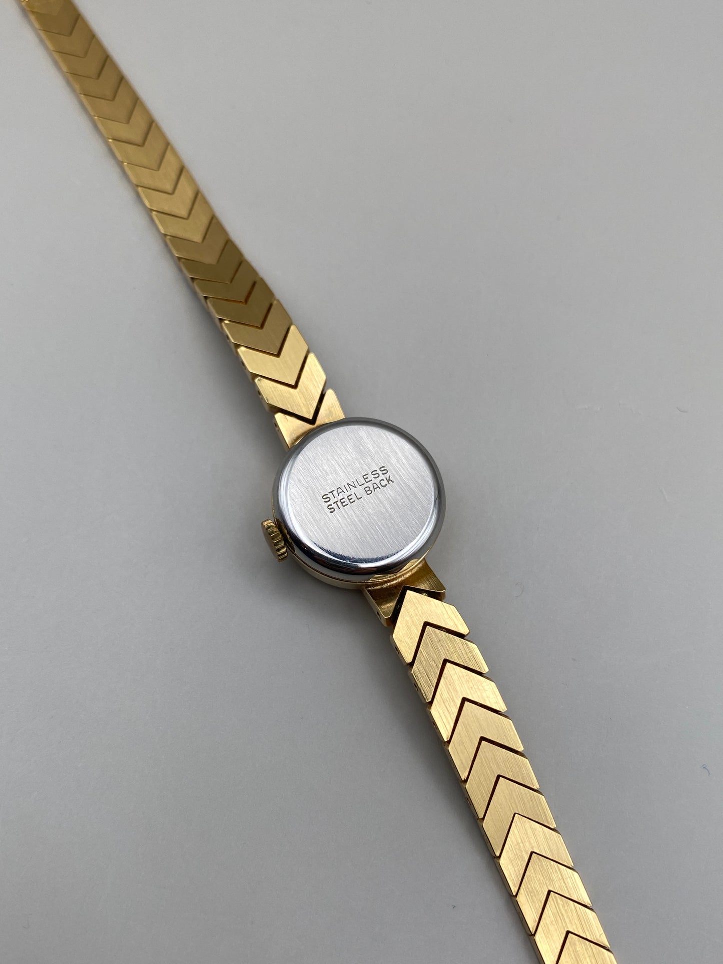 Montre Fortis vintage 50s – montre-bijou à bracelet chevrons (laqué or)