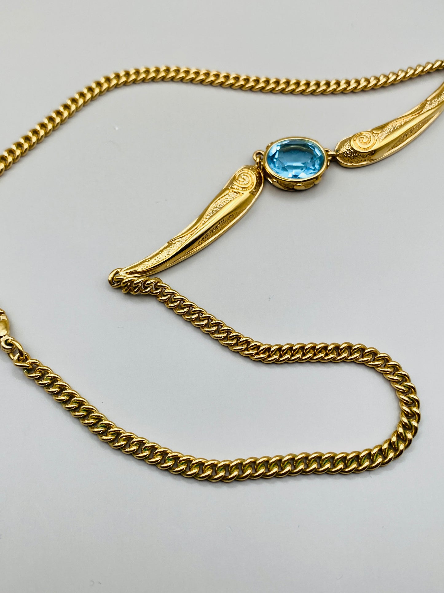 Collier Pierre Lang vintage – doré à pierre bleue centrale