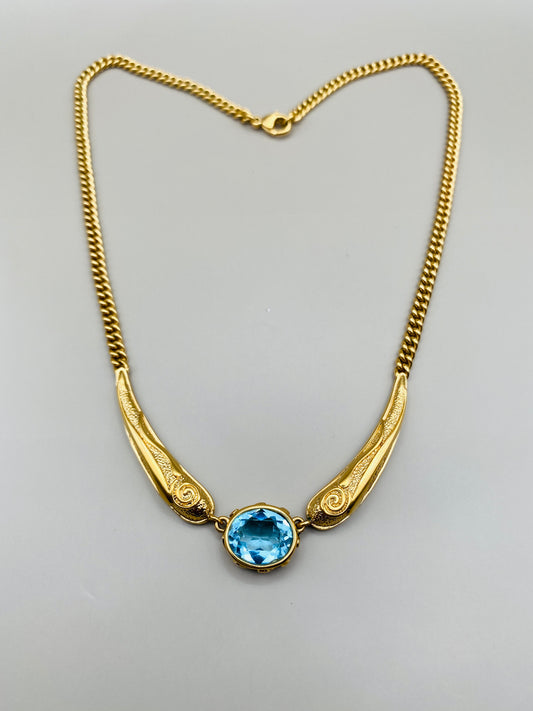 Collier Pierre Lang vintage – doré à pierre bleue centrale