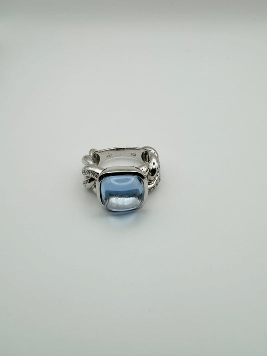 Bague contemporaine en argent 925 et topaze bleue