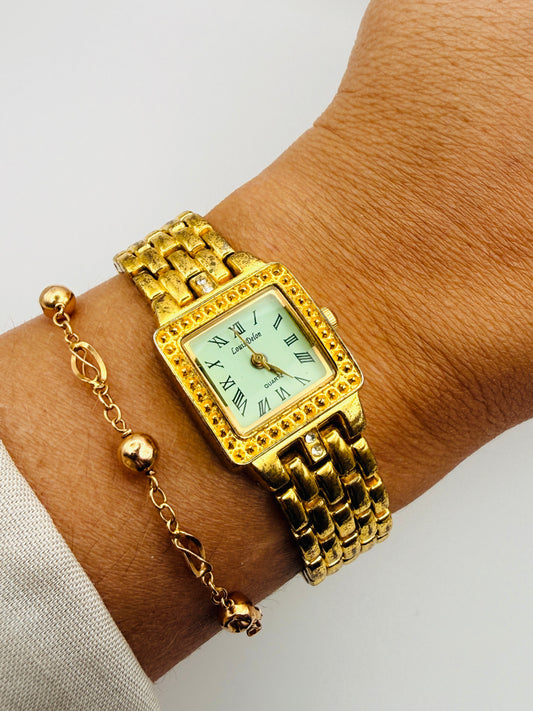 Montre vintage Louis Dolon dorée – cadran carré serti de strass