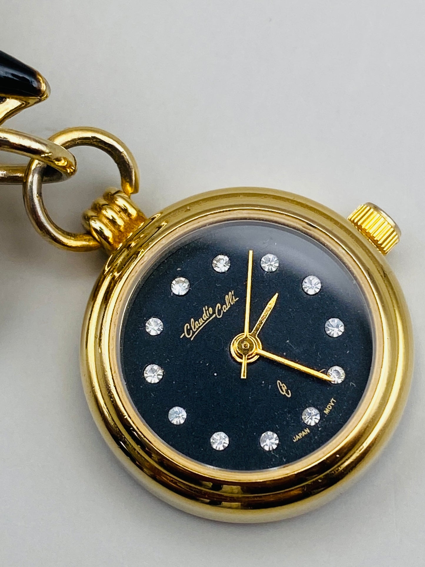 Broche-montre Vintage Claudio Calli – Émail noir et dorure