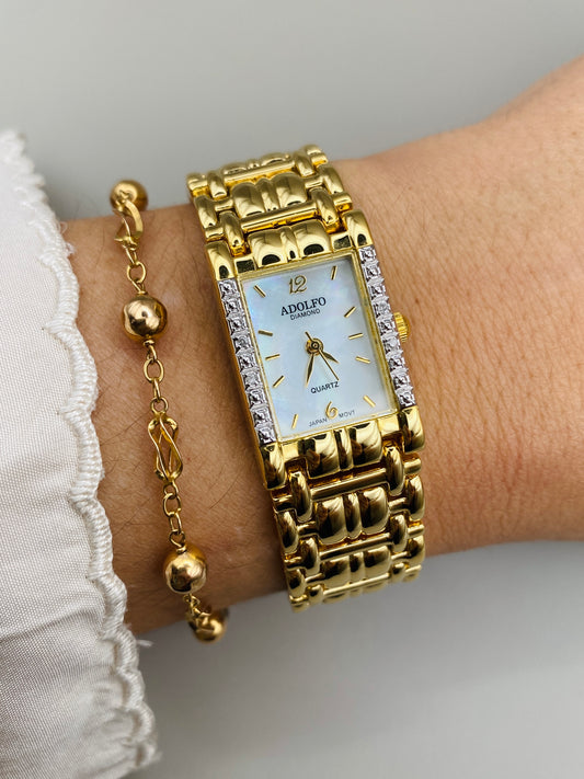 Montre bijou Adolfo Diamond – Cadran nacré & diamants – État neuf